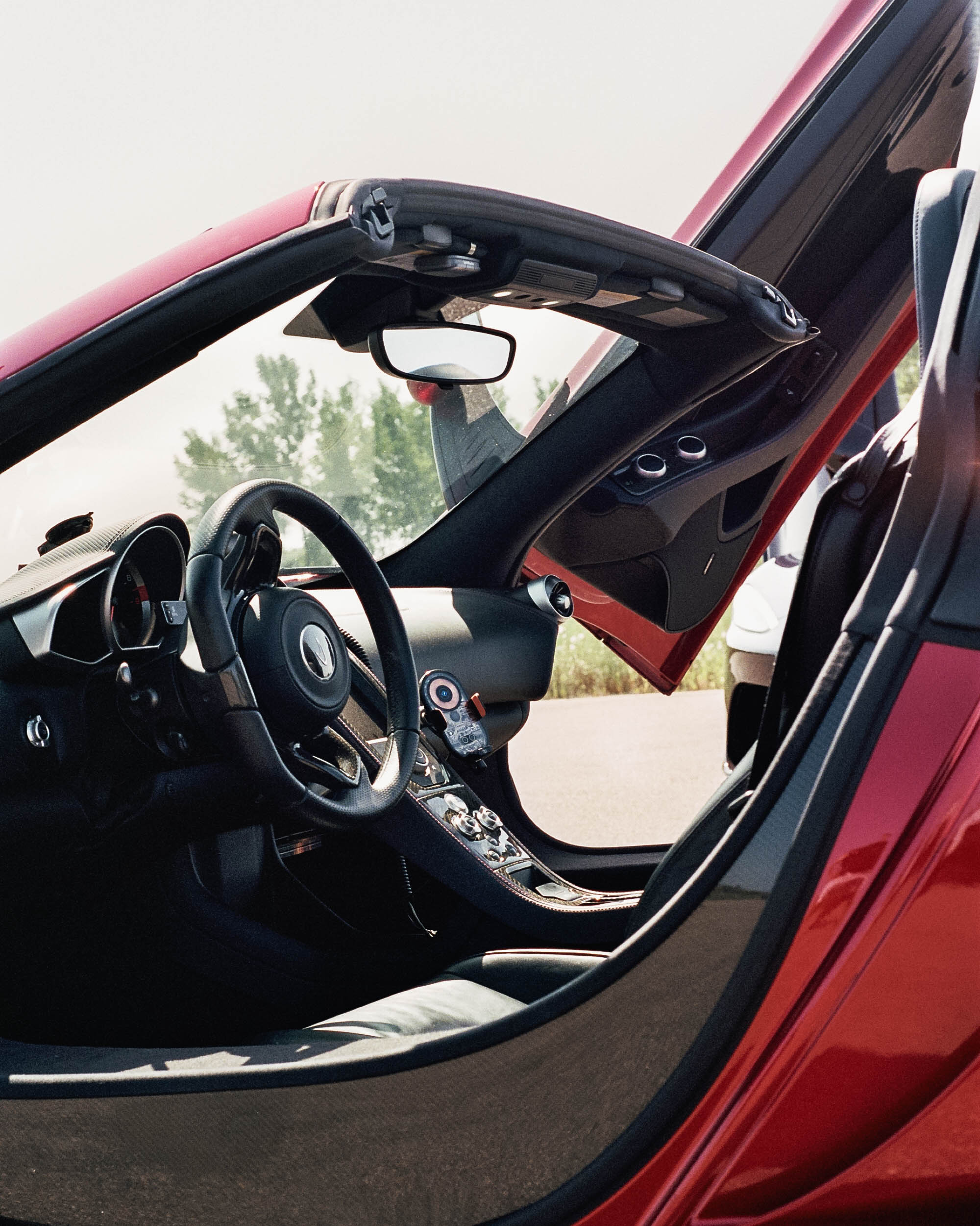 Red McLaren cockpit and interior photographed by Alphpixels
